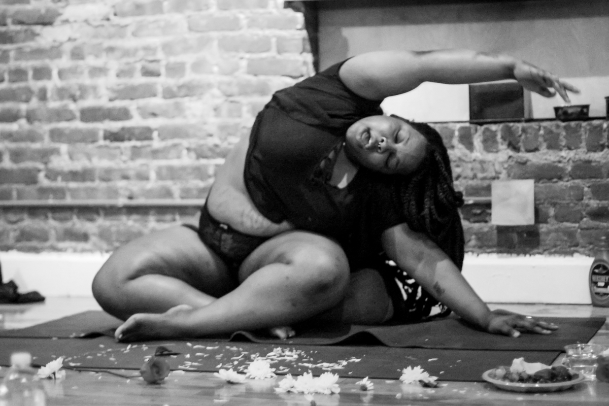 A participant arching open during sensual warm-up