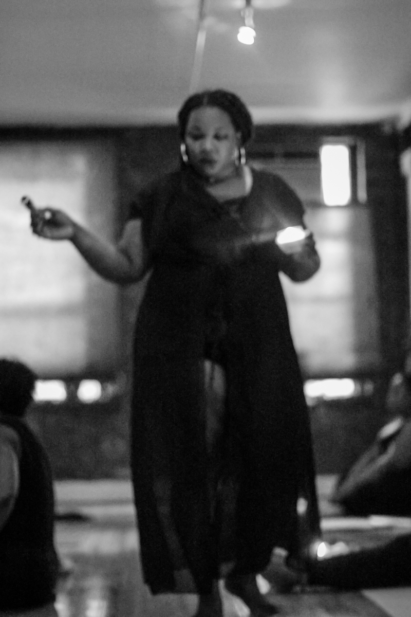 Rashida holding space at the opening of an immersion